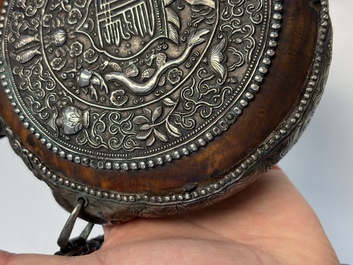 A Tibetan red-coral and malachite-inlaid and silver-mounted 'Ba Ji Xiang' wine bottle, 19th C.