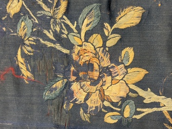 Two Chinese embroidered silk panels with antiquities and birds among flowering branches, 19th C.