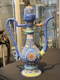 A Chinese Canton blue-ground enamel ewer and cover with floral design, 19th C.