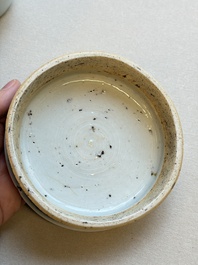 A Chinese blue and white covered jar and two polychrome-decorated jarlets with wooden covers, 18/19th C.