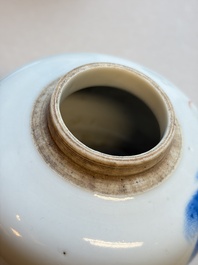 A Chinese blue and white covered jar and two polychrome-decorated jarlets with wooden covers, 18/19th C.