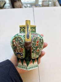 Three famille verte-style and verte biscuit-style teapots, a wine pot and a model of Dongfang Shuo, Samson, Paris, Ding mark, 19th C.