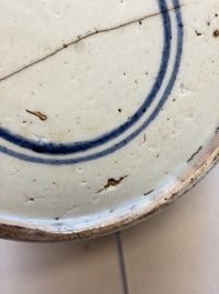 A Chinese blue and white covered jar and two polychrome-decorated jarlets with wooden covers, 18/19th C.