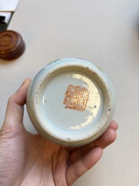 A Chinese blue and white covered jar and two polychrome-decorated jarlets with wooden covers, 18/19th C.