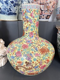 A Chinese famille rose yellow-ground 'Tianqiu Ping' vase with dragons and flowers, 20th C.