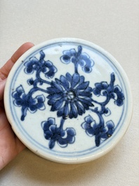 A Chinese blue and white covered jar and two polychrome-decorated jarlets with wooden covers, 18/19th C.