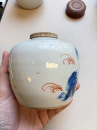 A Chinese blue and white covered jar and two polychrome-decorated jarlets with wooden covers, 18/19th C.