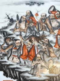 A Chinese grisaille and iron-red decorated '18 Luohan' plaque, Qianlong mark, 20th C.