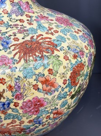 A Chinese famille rose yellow-ground 'Tianqiu Ping' vase with dragons and flowers, 20th C.