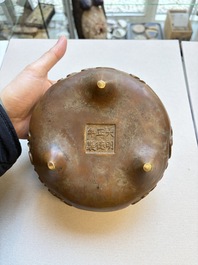 A Chinese bronze tripod censer with Arabic inscription, Zhengde mark, 19th C.