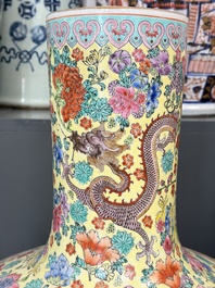 A Chinese famille rose yellow-ground 'Tianqiu Ping' vase with dragons and flowers, 20th C.