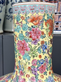 A Chinese famille rose yellow-ground 'Tianqiu Ping' vase with dragons and flowers, 20th C.