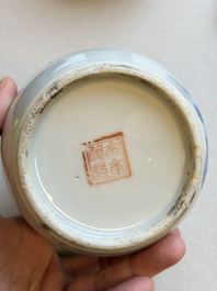 A Chinese blue and white covered jar and two polychrome-decorated jarlets with wooden covers, 18/19th C.
