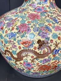 A Chinese famille rose yellow-ground 'Tianqiu Ping' vase with dragons and flowers, 20th C.