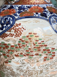 A large Japanese Imari 'Shishi Lions' vase, Kutani Taniguchi 九谷 谷口 mark, Meiji, 19th C.