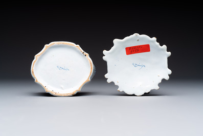 A blue and white Dutch Delft butter tub with a polychrome bird-shaped finial, 18th C.
