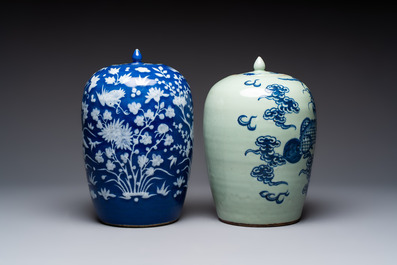 A pair of Chinese blue and white covered vases and two covered jars, Kangxi mark, 19th C