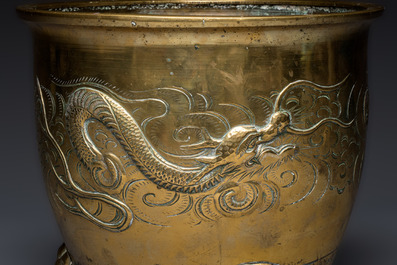 A large Chinese bronze 'Dragon' tripod censer, 19th C.