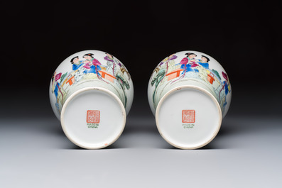A pair of Chinese famille rose 'Meiping' vases with elegant beauties in a garden, Qianlong mark, 20th C.