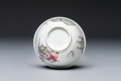 A fine Chinese famille rose 'Court Lady and a Boy' cup and saucer, Yongzheng