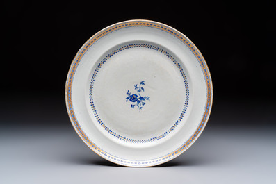 Two Chinese export famille rose plates and three gilt blue-enamelled plates, Qianlong/Jiajing