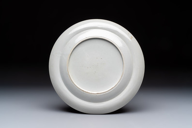 Two Chinese export famille rose plates and three gilt blue-enamelled plates, Qianlong/Jiajing