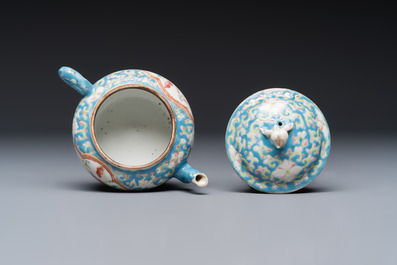 Three Chinese famille rose blue- and yellow-ground teapots and covers for the Straits or Peranakan market, Tongzhi marks, 19th C.