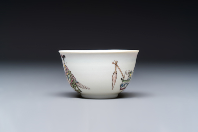 A fine Chinese famille rose 'Court Lady and a Boy' cup and saucer, Yongzheng