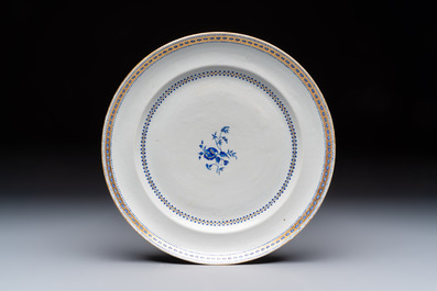 Two Chinese export famille rose plates and three gilt blue-enamelled plates, Qianlong/Jiajing