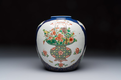 A Chinese famille verte gilt-decorated blue-ground 'Dragon and Phoenix' vase, Kangxi mark, 19th C.