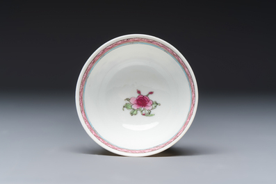 A fine Chinese famille rose 'Court Lady and a Boy' cup and saucer, Yongzheng