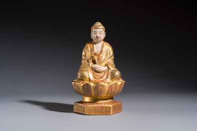 A Japanese Satsuma figure of Buddha seated on a lotus base, Hododa 保土田 mark, Meiji, 19/20th C.
