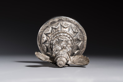 A repouss&eacute; silver figure of Garuda, Southeast Asia, 19/20th C.