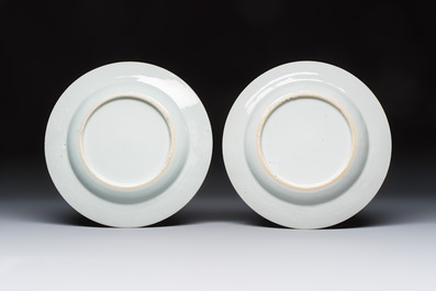 A pair of Chinese famille rose 'Peacock and Flowers' plates, Yongzheng