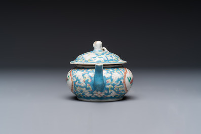 Three Chinese famille rose blue- and yellow-ground teapots and covers for the Straits or Peranakan market, Tongzhi marks, 19th C.