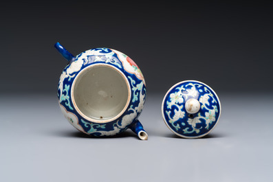 Three Chinese famille rose blue- and yellow-ground teapots and covers for the Straits or Peranakan market, Tongzhi marks, 19th C.