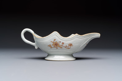 A Chinese armorial plate, a serving dish and a sauce boat with the arms of de Heere for the Dutch market, Qianlong, ca. 1735-1765