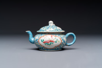 Three Chinese famille rose blue- and yellow-ground teapots and covers for the Straits or Peranakan market, Tongzhi marks, 19th C.