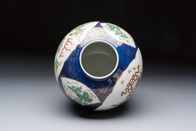 A Chinese famille verte gilt-decorated blue-ground 'Dragon and Phoenix' vase, Kangxi mark, 19th C.