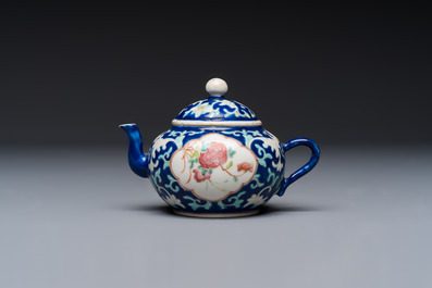 Three Chinese famille rose blue- and yellow-ground teapots and covers for the Straits or Peranakan market, Tongzhi marks, 19th C.