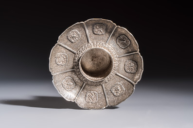 A Tibetan ritual jade bowl with a red coral-mounted silver cover and a stand, 19th C.
