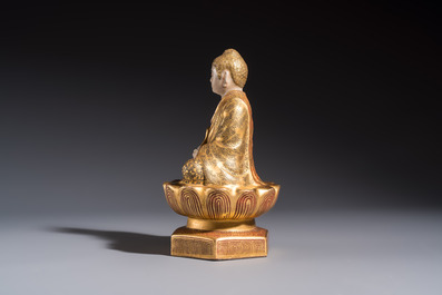 A Japanese Satsuma figure of Buddha seated on a lotus base, Hododa 保土田 mark, Meiji, 19/20th C.