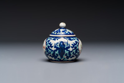 Three Chinese famille rose blue- and yellow-ground teapots and covers for the Straits or Peranakan market, Tongzhi marks, 19th C.