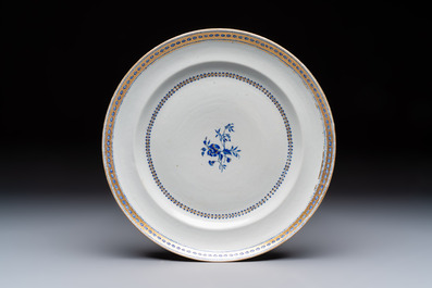 Two Chinese export famille rose plates and three gilt blue-enamelled plates, Qianlong/Jiajing
