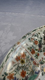 A large Chinese famille verte 'Pavilion with Birds among Flowering Branches' dish, Kangxi