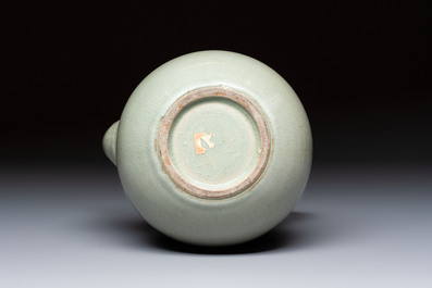 A Korean celadon-glazed ewer with twisted handle, 20th C.