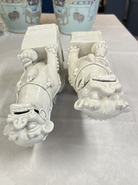A pair of large Chinese Dehua blanc de Chine Buddhist lion joss stick holders, 19th C.