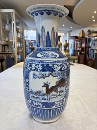 A Chinese blue, white and copper-red 'Deer' vase, 19th C.