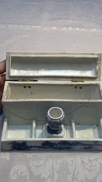 A Chinese blue and white 'Mountainous Landscape' writing set with an inkwell, sander and candlestick, Qianlong