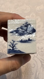 A Chinese blue and white 'Mountainous Landscape' writing set with an inkwell, sander and candlestick, Qianlong